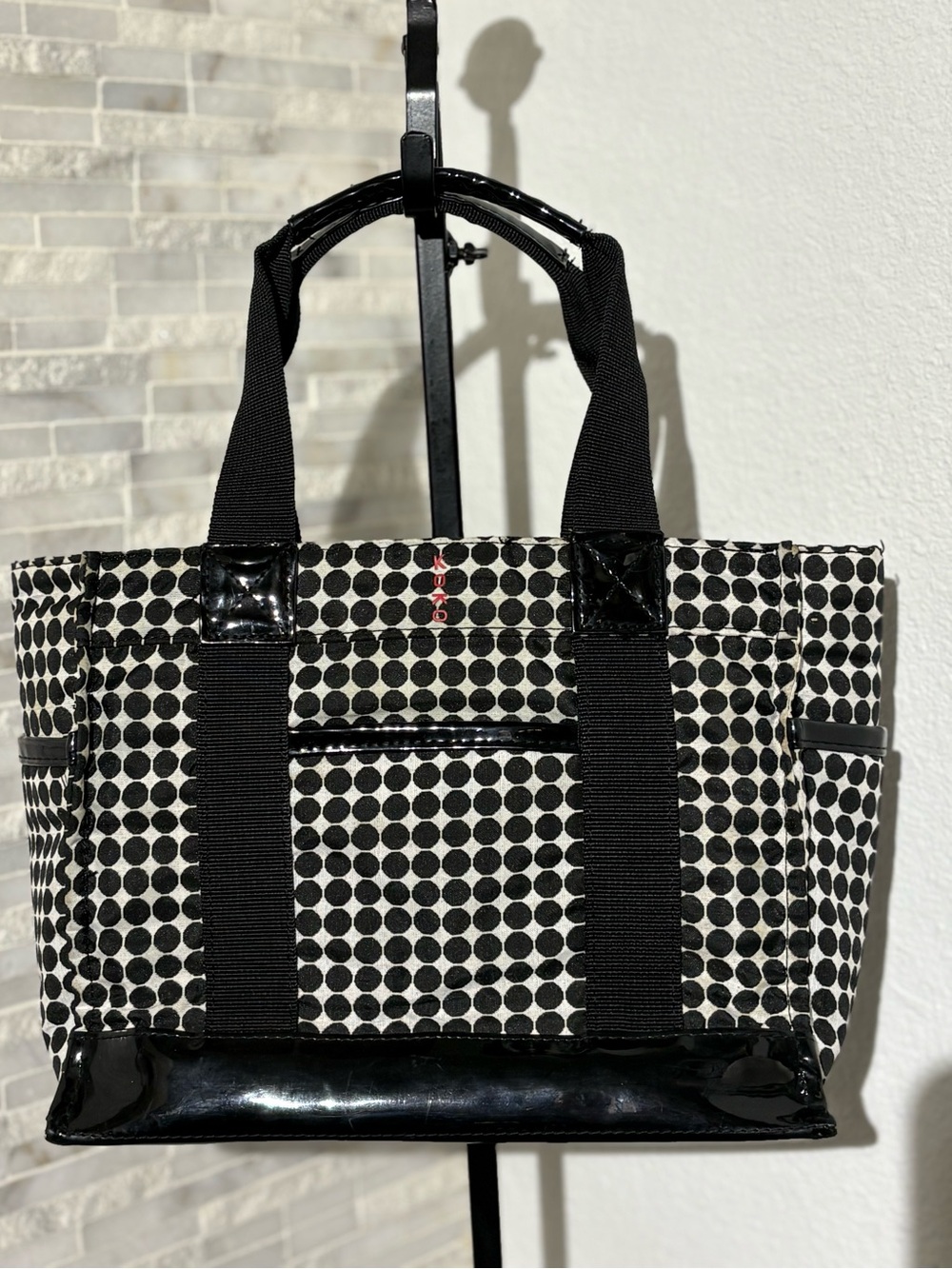 KoKo black and white polka dot insulated lunch tote.